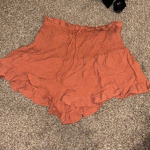 Never worn peach flowy shorts